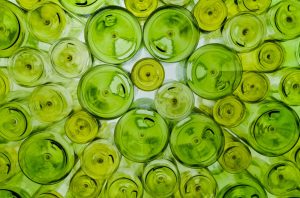 Assorted green glass bottles