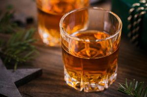 glass of whisky with festive decorations