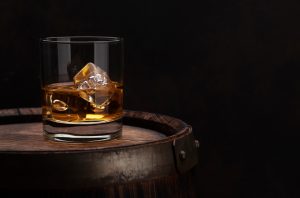 image of a glass of whiskey on the rocks
