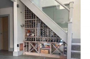 A & W Moore Wine Racks UK's under stairs wine rack with glass screen