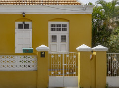 Orange House, White Trim, Green Mailbox