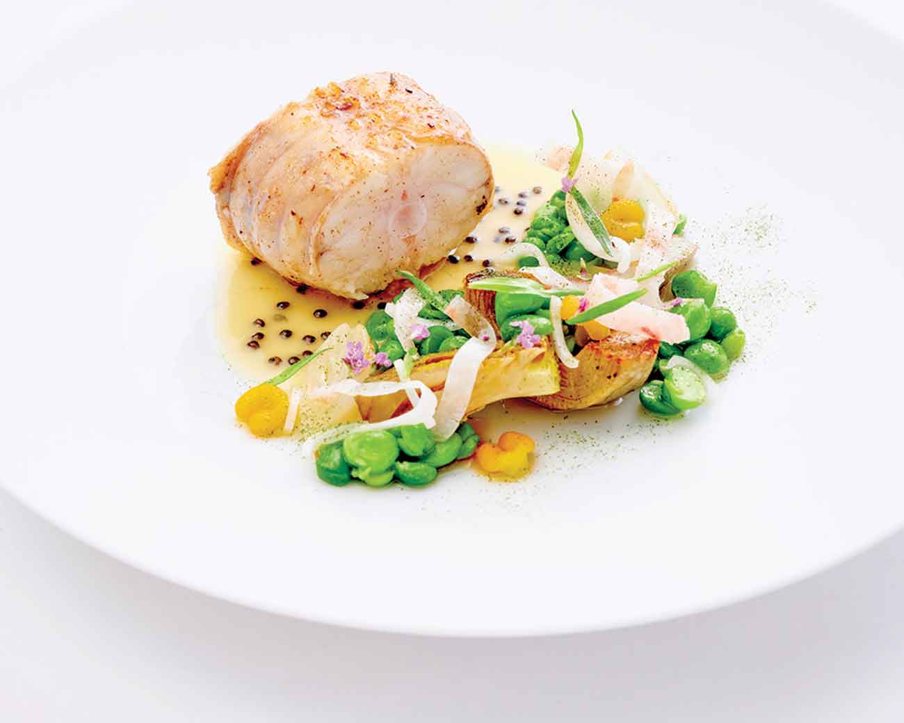 Dish of monkfish with vegetables