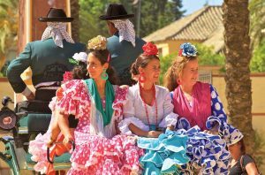 Flamenco dancers on the move at the Jerez Horse Fair, or Feria del Caballo.