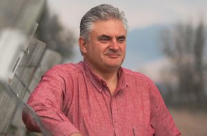 A winemaker in a vineyard