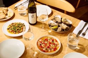 sake and food selection on table