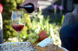 A glass of Pinot Noir wine at the Church House Gourmet Retreat in Victoria's Fish Creek in the Gippsland region.