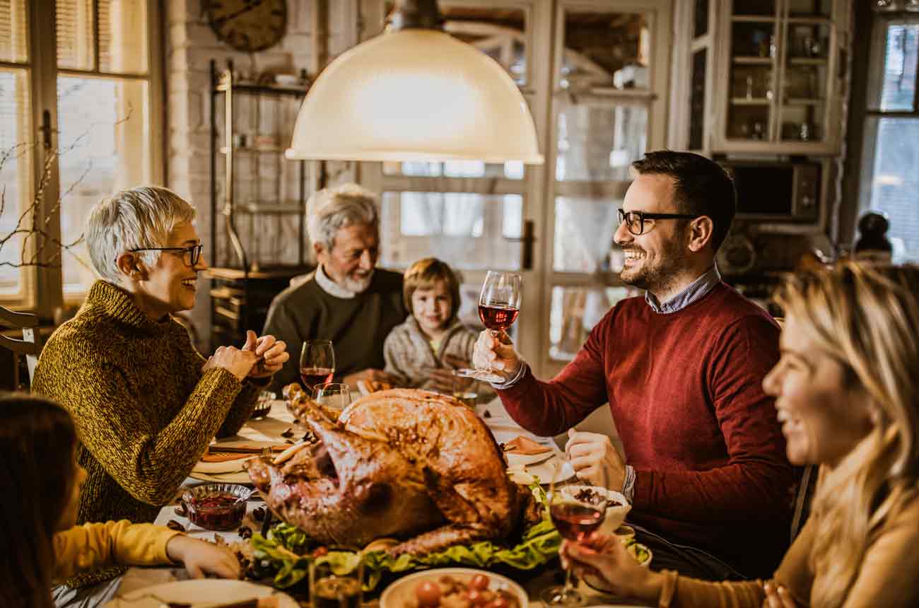 image of a family at Thanksgiving