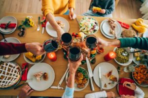 image of a toast at a Thanksgiving table