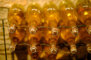 Bottles of champagne ageing in the cellar of Champagne Henri Lemaire. Credit: Thierry Monasse / Getty Images News via Getty Images