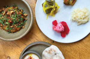 A trio of starters at Rovi, including fermented vegetables and tahini with Rovi’s ‘classic’ pita.