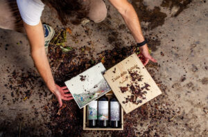 Emanuele Graetz with bottles of wine from Isola delle Falcole