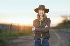 Image of Cambria winemaker Jill Russell in the vineyard.